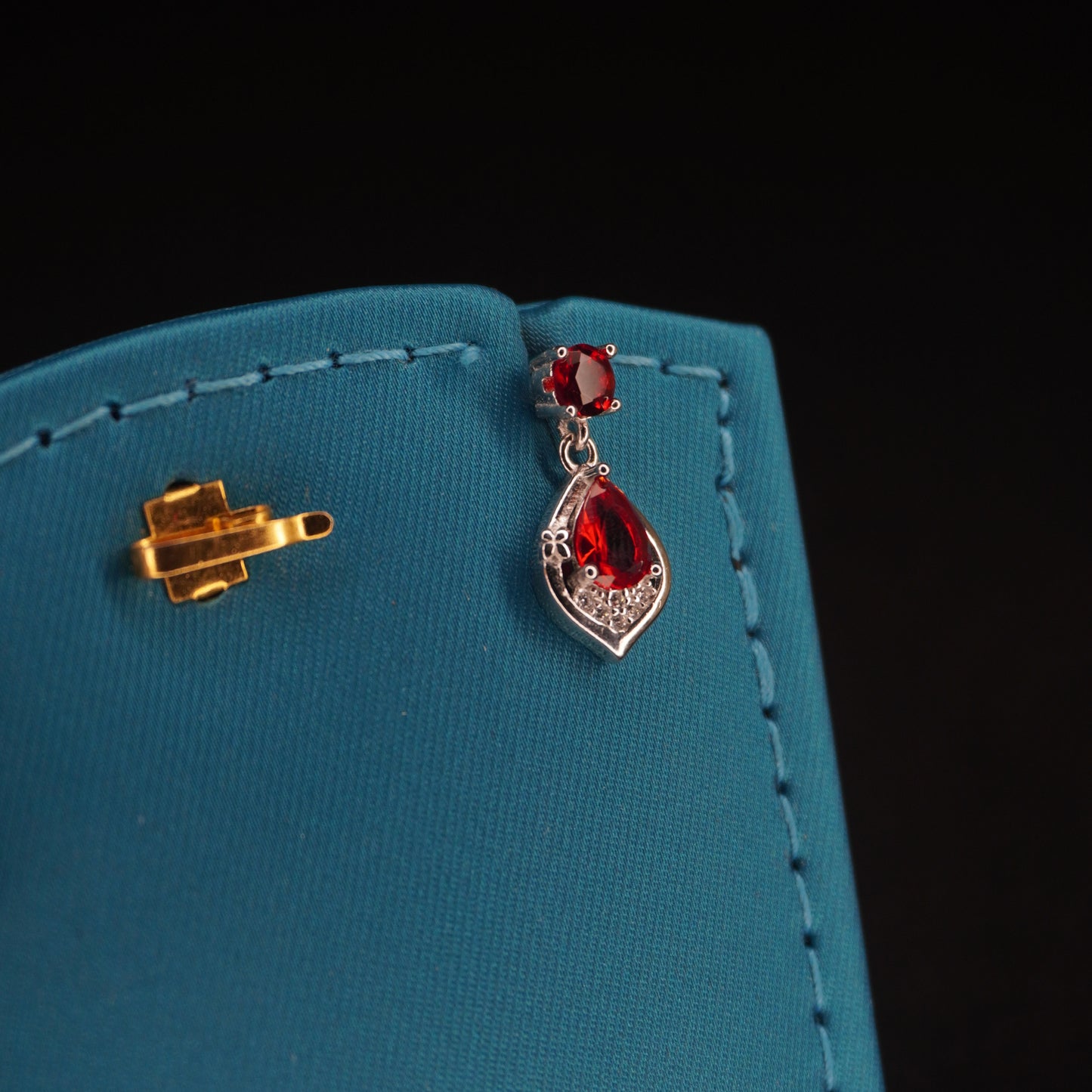 Red stone with drops