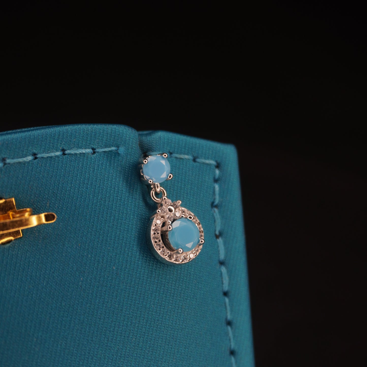 Blue stone with round shaped drops