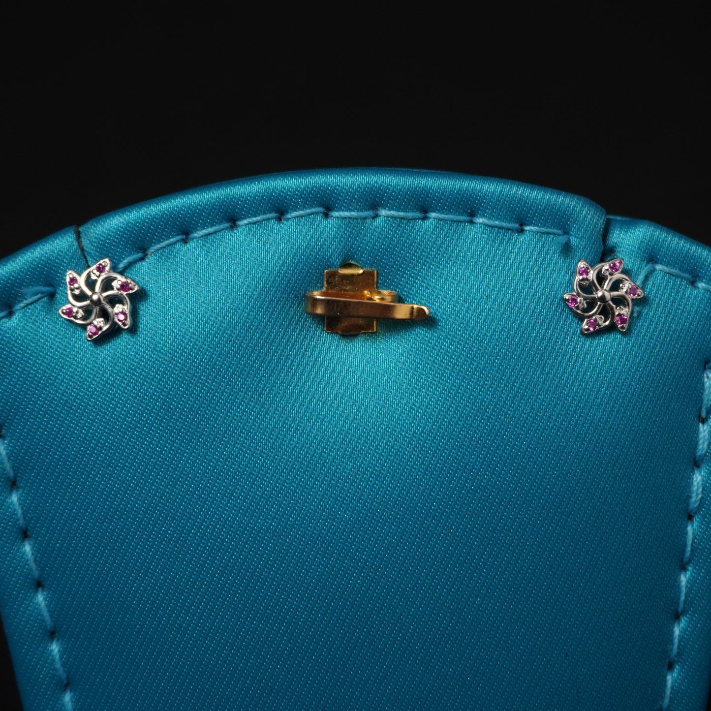 floral pattern with pink stone stud