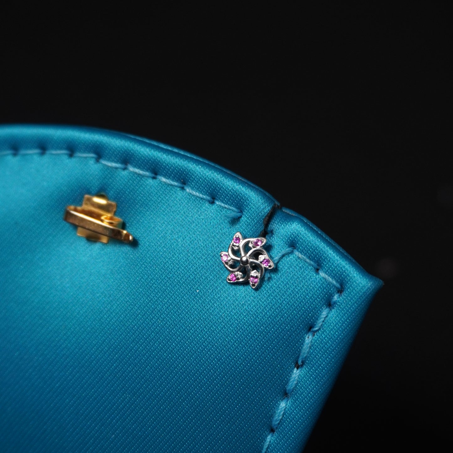 floral pattern with pink stone stud