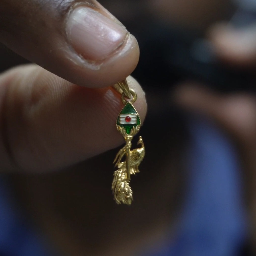 Vel Mayil green Enameled Dollar