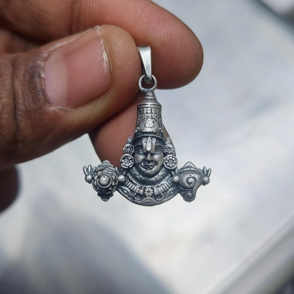 Antique perumal face dollar