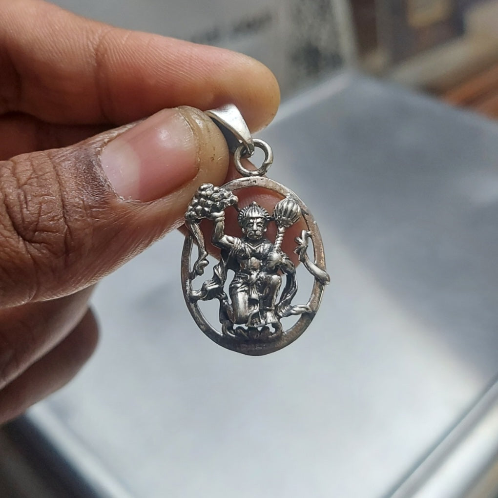 Hanuman holding mountain with tiruvachi