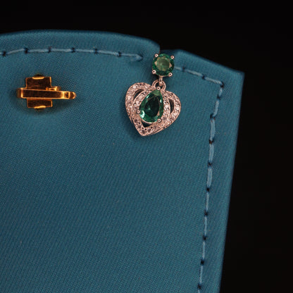 EMERALD STONE WITH HEART SHAPED DROPS