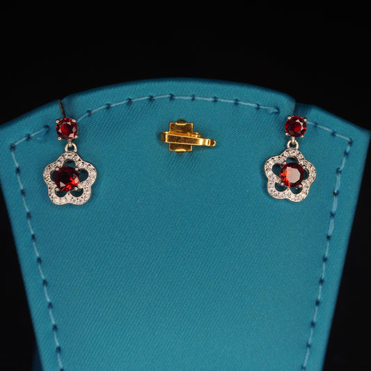 Red stone with flowral shaped drops