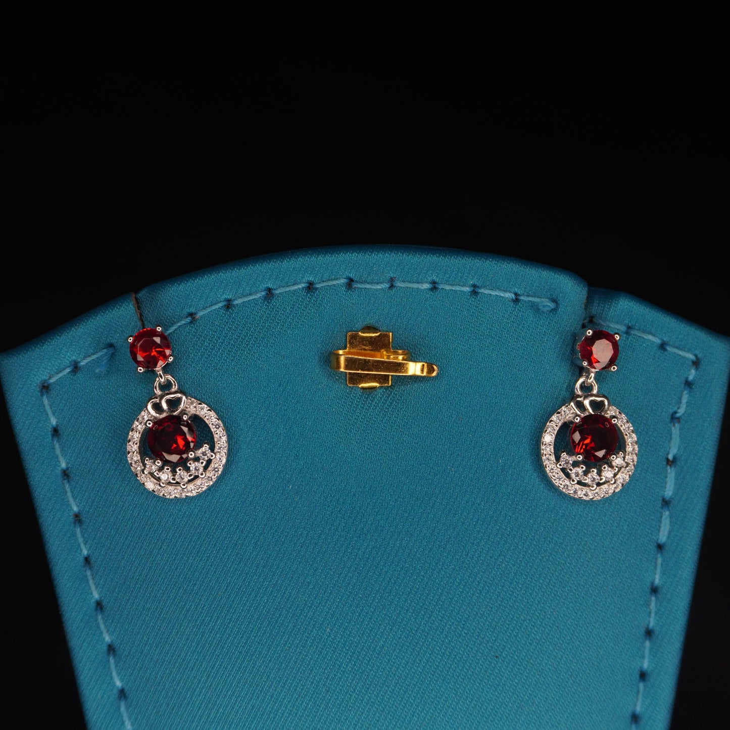 Red stone with round shaped drops