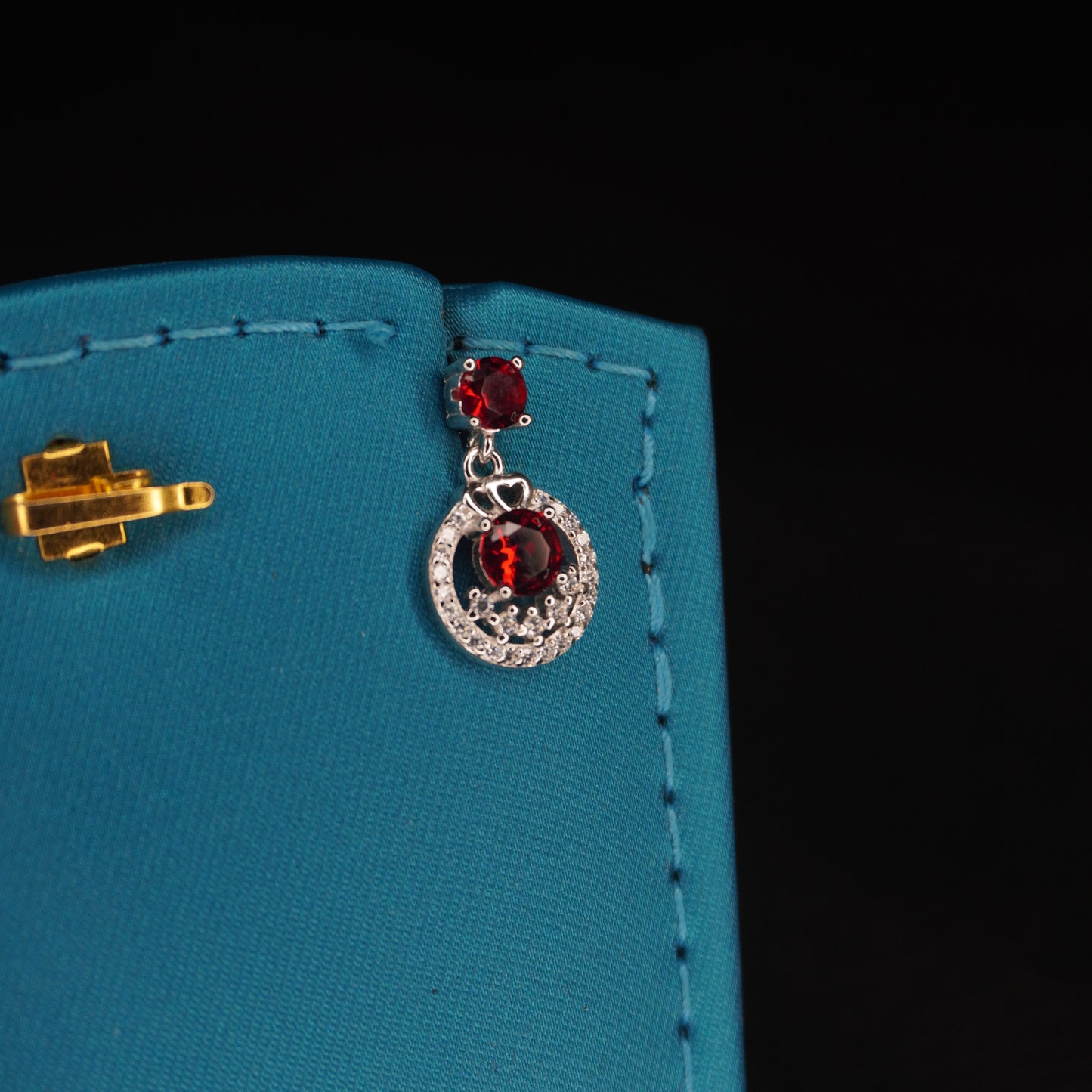 Red stone with round shaped drops